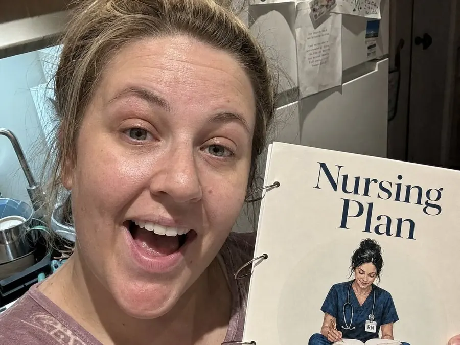 Kayla B. with her copy of the Nursing Plan