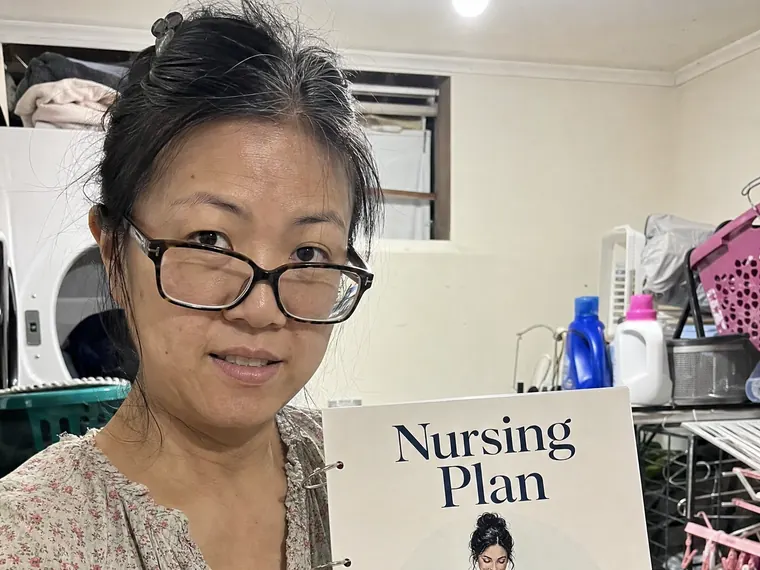 June K. with her copy of the Nursing Plan
