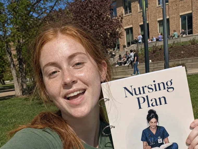 Erin D. with her copy of the Nursing Plan