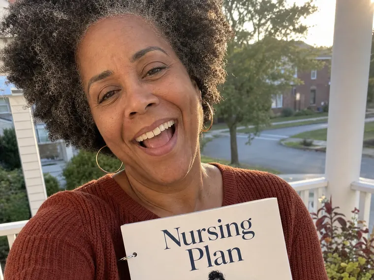 Yvonne C. with her copy of the Nursing Plan